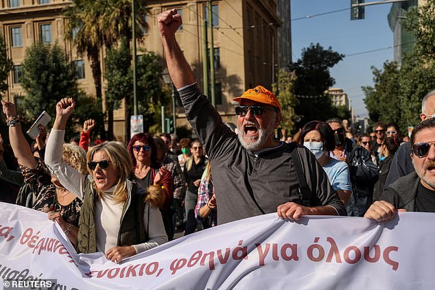 Protesters shout slogans as they demonstrate during a 24-hour general strike, in Athens, Greece, November 9, 2022