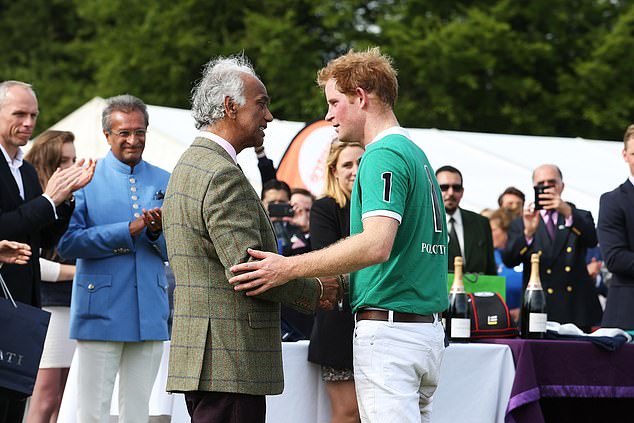 Prince Harry with Kuldip Singh Dhillon.  The nickname for him 'Sooty' arose after Harry was accused of racism when he called an army colleague 'our little friend P**i'