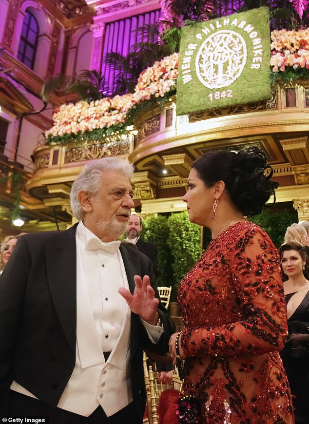 The Three Tenors opera singer appeared in deep conversation with Netrebko, who styled her dark brunette locks into a sleek updo.