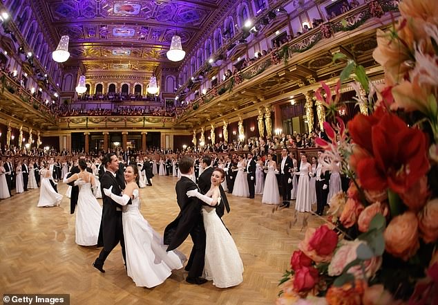 The debutantes held on tight to their partners as they waltzed across the dance floor throughout the night.