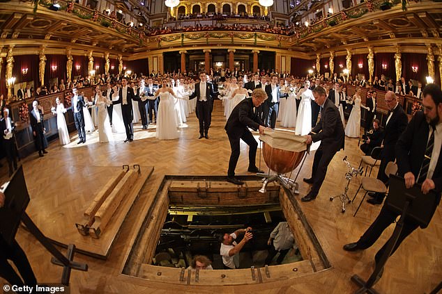 The crews worked incredibly carefully to put away the heavy instruments after the opening performance.