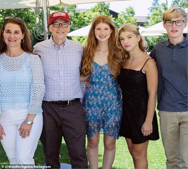 In 2017, Microsoft founder Bill Gates said that he did not permit his children to own a mobile phone until they turned 14 . Pictured: Mr Gates (second from left), his ex wife Melinda (left), daughter Jennifer (centre), daughter Phoebe (second from right) and son Rory (right)