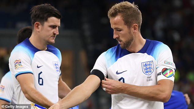 England captain Harry Kane (right) was banned from wearing a rainbow armband in support of the LGBT+ community at the last World Cup.