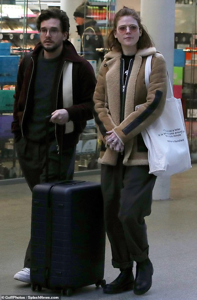 Waiting: Kit and Rose appeared to be waiting at Kings Cross St Pancras for a period of time on Friday