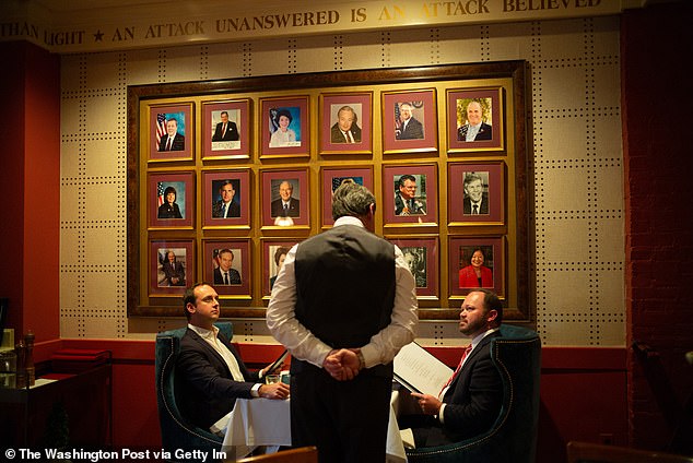 The Monocle has some framed photos of its famous patrons on the wall.