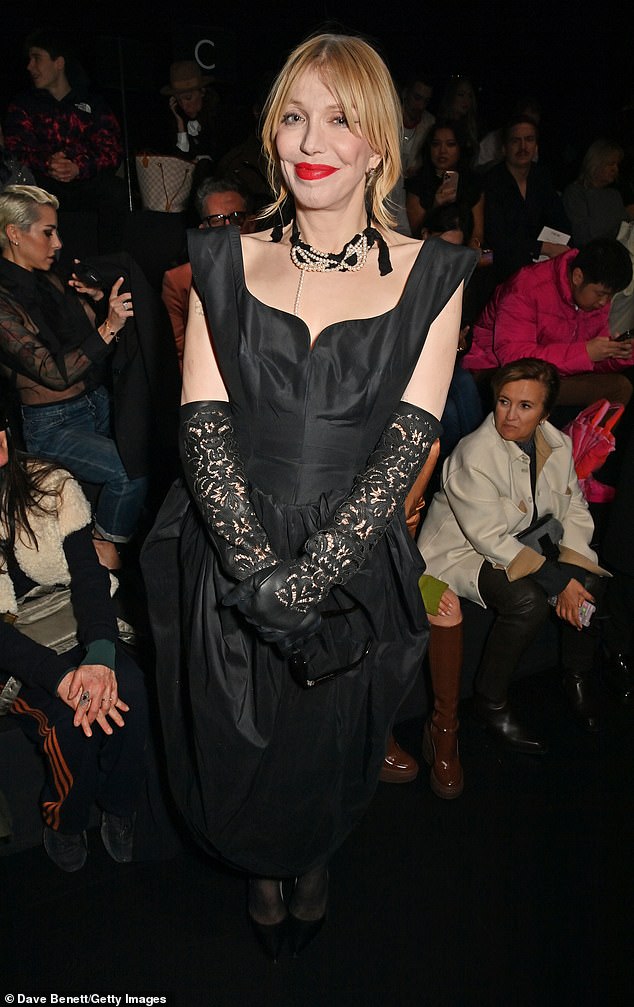 Dressed to impress: Singer Courtney, 58, cut a graceful figure in a corseted black dress with a floor-length tulip hem