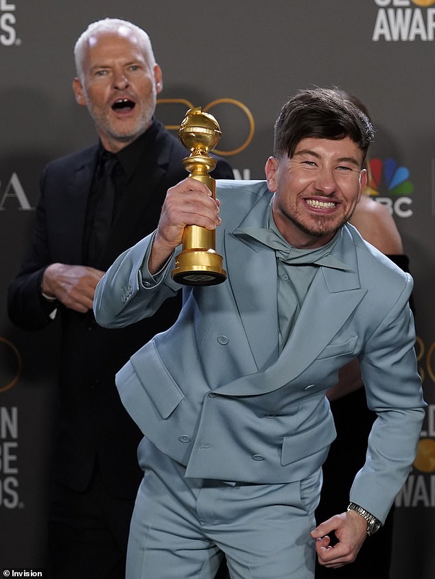 Barry Keoghan poses in the press room with the award for best motion picture, musical or comedy for "The Banshees of Inisherin" at the 80th Annual Golden Globe Awards at the Beverly Hilton Hotel