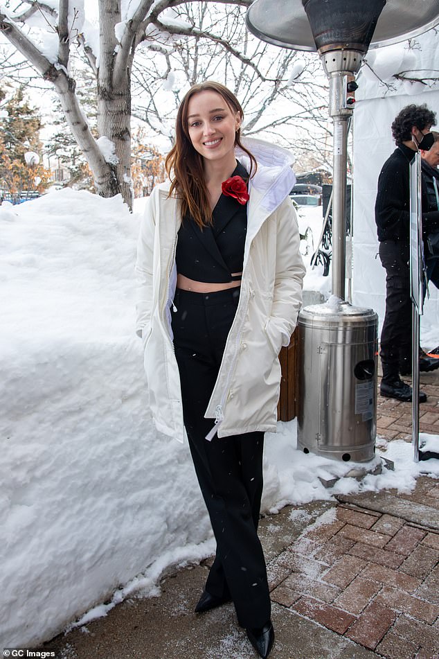 Brrrraving the cold: Phoebe wore a sexy cropped number to the premiere despite the snow outside