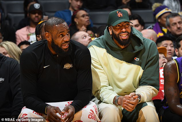 Davis has appeared at Lakers games in street clothes while sitting next to his teammates.