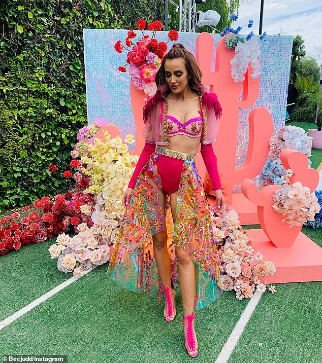 Dubbing the 'Juddchella' event, after the Coachella event in California, Bec enlisted the help of one of Australia's top party planners and a team of experts to recreate the Coachella festival in her backyard Pictured: Bec se she dressed to a party for her housewarming in 2019