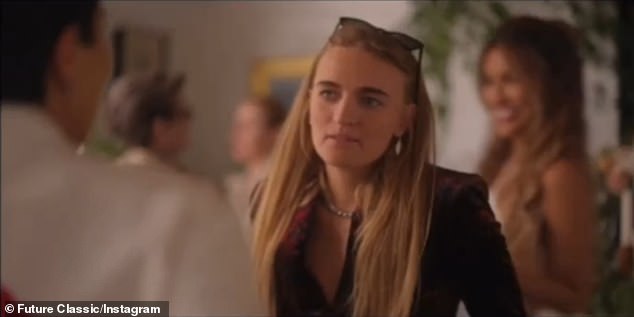 At one point during the scene (pictured), the non-binary musician, whose real name is Georgia Claire Flipo, calls out to her Selling partner Sunset American 