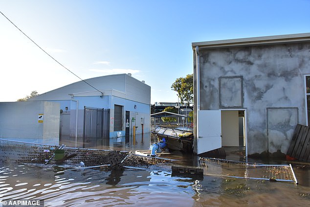 Flood damage to a town's heated swimming pool building in Forbes in west-central New South Wales on Thursday