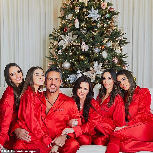 Mother of four: In the past, Richards has talked about getting a liposuction procedure after she struggled to lose weight as a parent of four;  In the photo she is with her husband Mauricio Umansky, 52, and her daughters Farrah, 34, Alexia, 26, Sophia, 22, and Portia, 15.