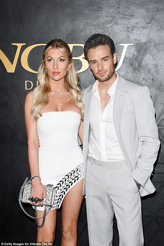 Matching: The One Direction star, 29, and Kate, 23, matched their outfits, with Kate wearing a white minidress and Liam wearing a white shirt and gray suit