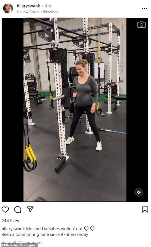 Working out with twins: In the clip, the PS I Love You star wore a tight, long-sleeved gray top that showed off her baby bump