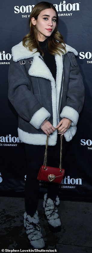 Looking fab: Casey Affleck's longtime girlfriend Caylee Cowan radiated wintery style in a white and silver fleece-lined coat and plush boots