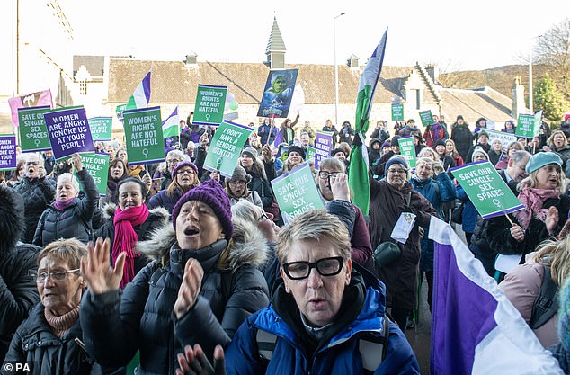 Supporters of For Women Scotland and the Scottish Feminist Network take part in a demonstration outside the Scottish Parliament in Edinburgh.