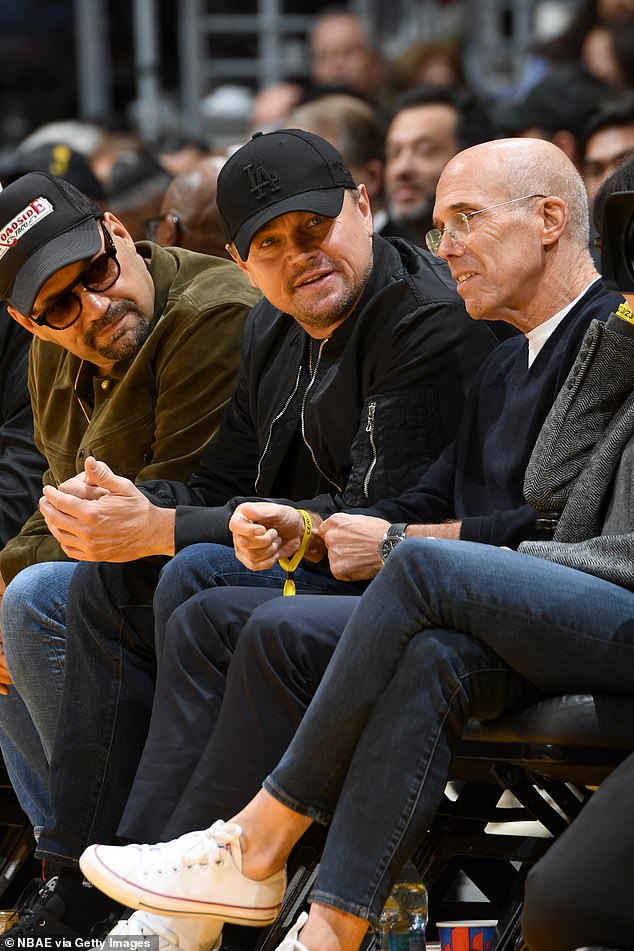 Prop: The Wolf Of Wall Street star also opted for a logo-embroidered black baseball cap "THE" in the front for the event