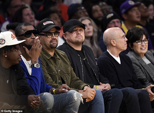 Game day: Leonardo headed to the Lakers basketball game with close friends at Crypto.com Arena