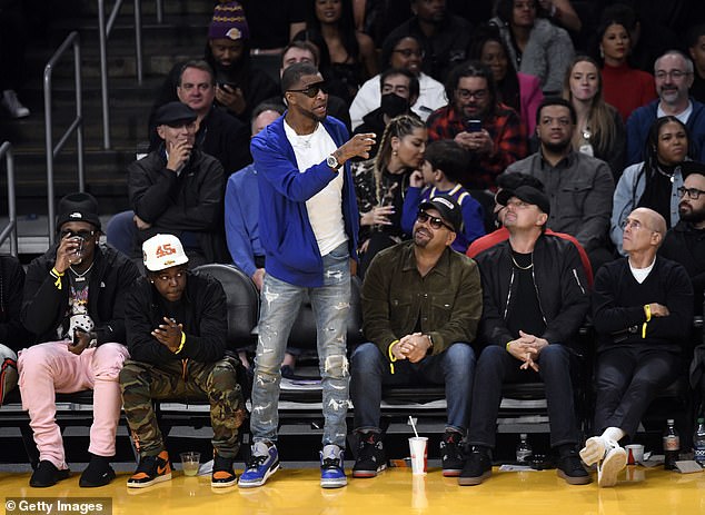 Front row: During the game, he was sitting in the front row with all his friends when Tee Morant (L), father of Memphis Grizzlies #12 Ja Morant, got up from his seat.