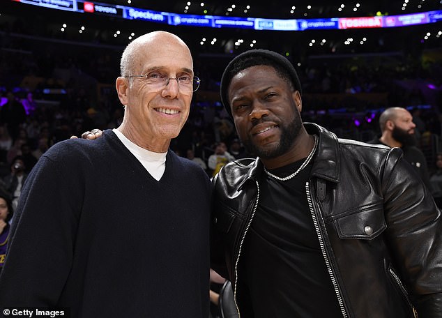 Say cheese!  Kevin Hart and Jeffrey Katzenberg pose during halftime