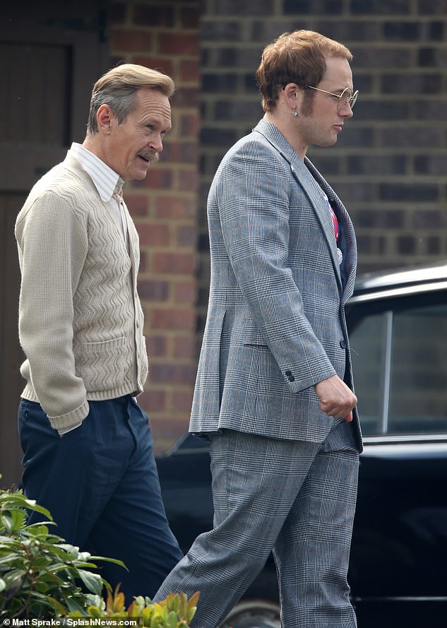 Dwight criticized Rocketman, the biopic starring Taron Egerton (right) as Elton John, saying his father (played by Steven Mackintosh, left) was portrayed as 