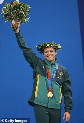 Chantelle Newbery on the podium after winning gold at the 2004 Olympics