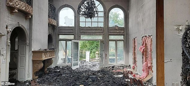 The lobby was completely destroyed after the roof collapsed, piles of debris were left on the floor, insulation was sticking out of the walls, and a chandelier burned out.