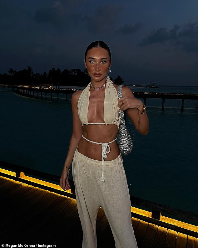 Two-Piece: Megan donned a pair of wide-leg linen pants in a low-rise design, which she teamed with a matching crop top