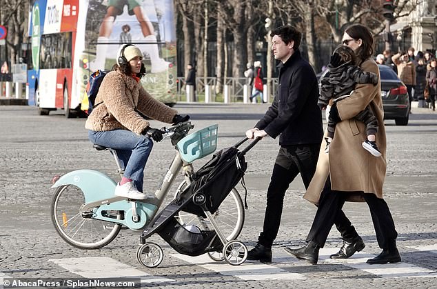 Swapped: They took turns carrying Levi and pushing the stroller as they walked around town.