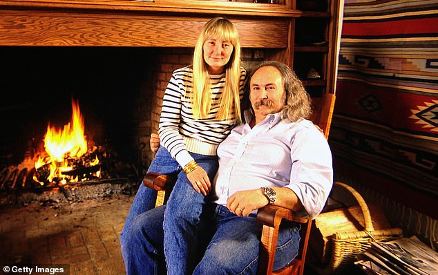 Surrogate parents: The Grammy winner and his wife, Jan Dance, became surrogate parents for Drew when she was 14 and needed a place to stay after rehab;  photographed in 1991