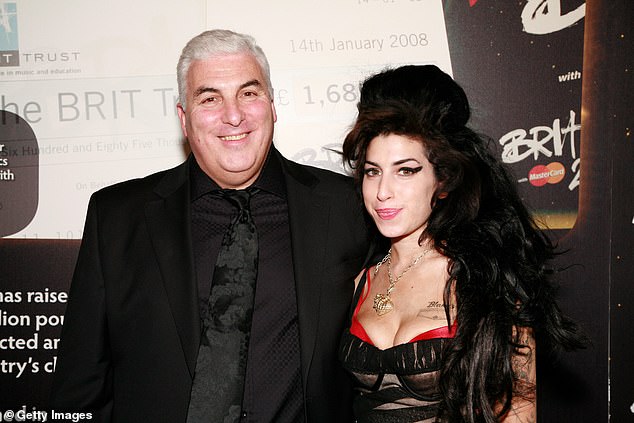 Mitch Winehouse and Amy Winehouse backstage at the 2008 BRIT Awards