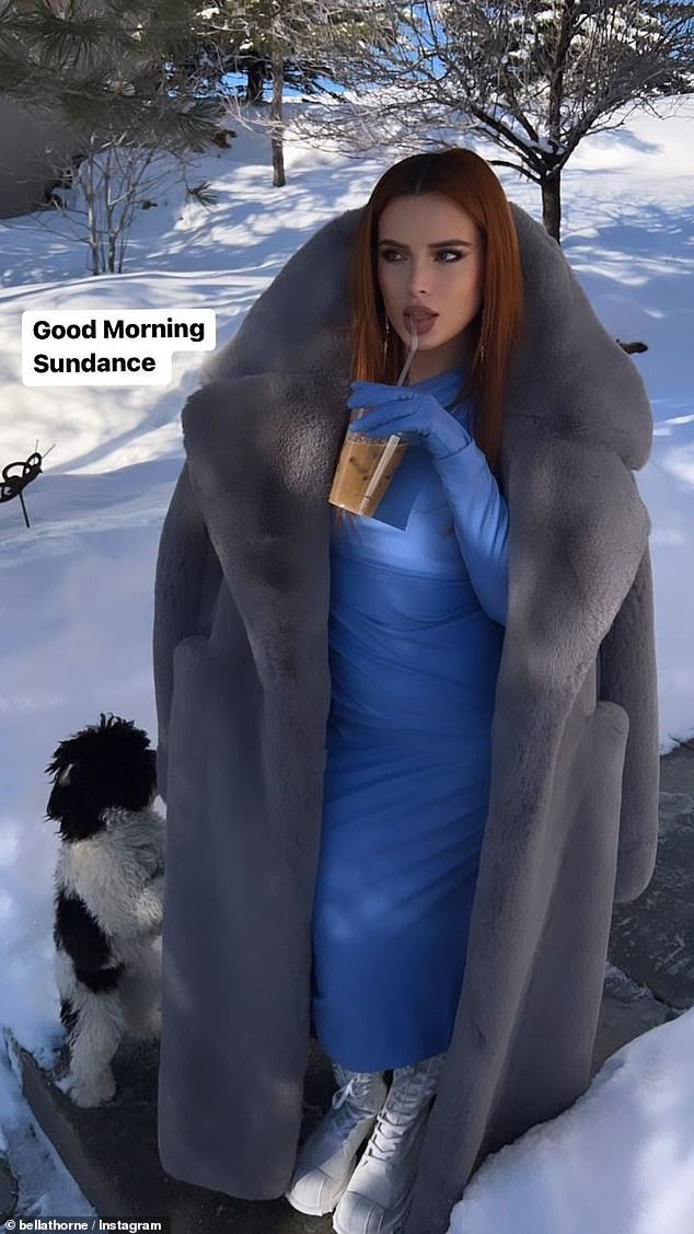Winter Wonderland: The former star of the Disney Channel series Shake It Up (2010-2013) kicked off her Sunday by visiting her Instagram page and posting a photo of herself in a blue dress and oversized gray coat while I was having a coffee in the middle of a snowy sky.  bottom
