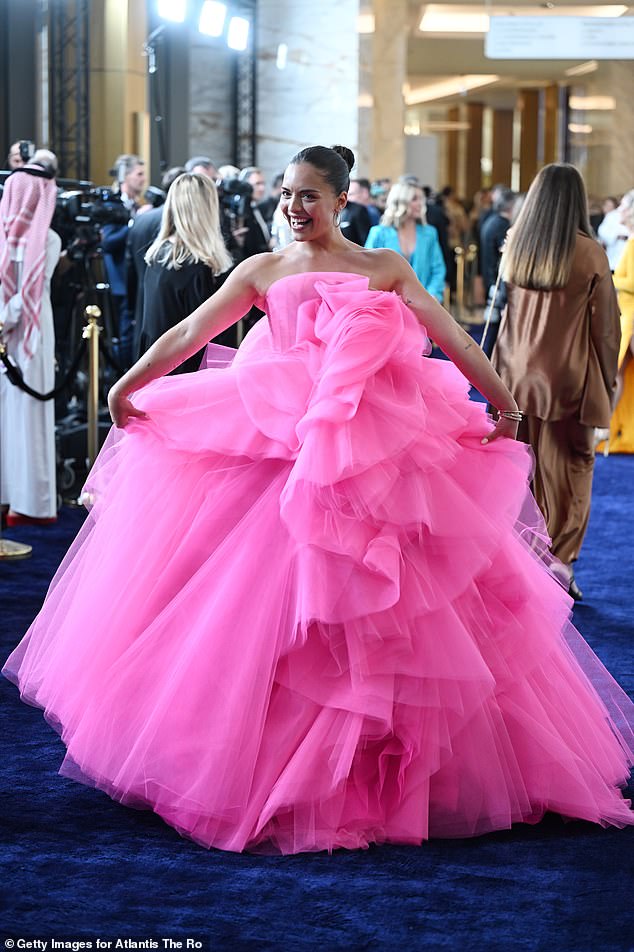 Meanwhile, newlywed actress Olympia Bellchambers dazzled in a voluminous pink tulle gown.