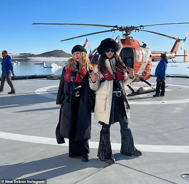 Fashion Duo: Nina and Zoey could be seen posing in front of a helicopter in their stylish outfits.