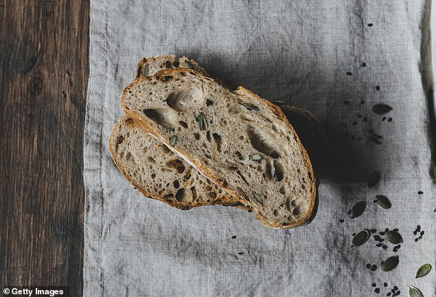 An easy way to identify good-quality sourdough is to look for minimal ingredients and tiny air bubbles in the bread (stock image), which indicate the fermentation process.