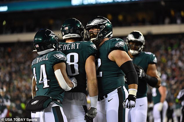 Dallas Goedert (88) celebrates his touchdown with Philadelphia Eagles center Jason Kelce