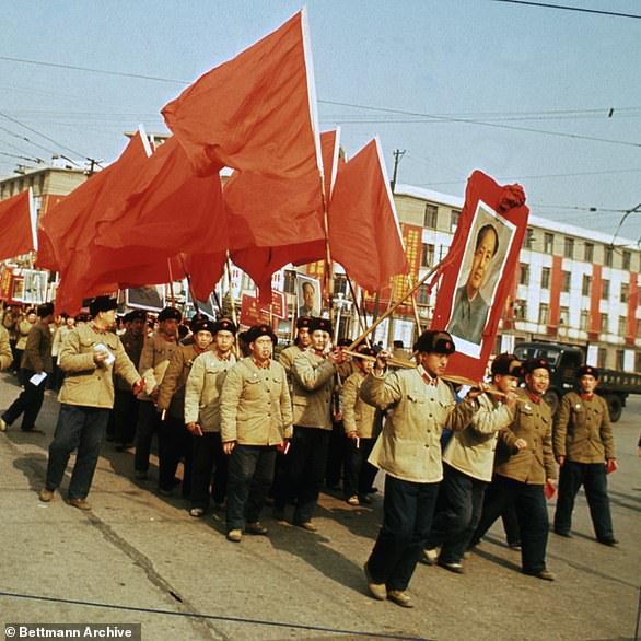 Fervor: Red Guards parade through the streets of Beijing in 1967