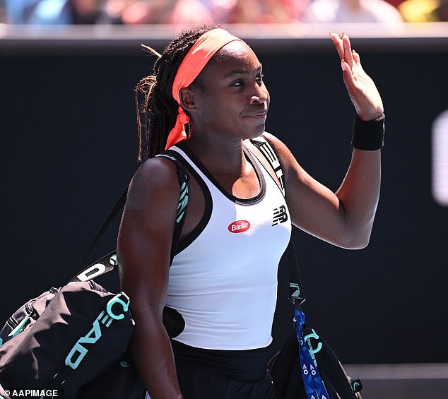 Gauff waves goodbye to the crowd after exiting the women's singles in round four.