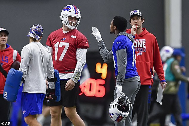 Dorsey (right) has overseen a brilliant season for Josh Allen (center) and the Bills' offensive line.