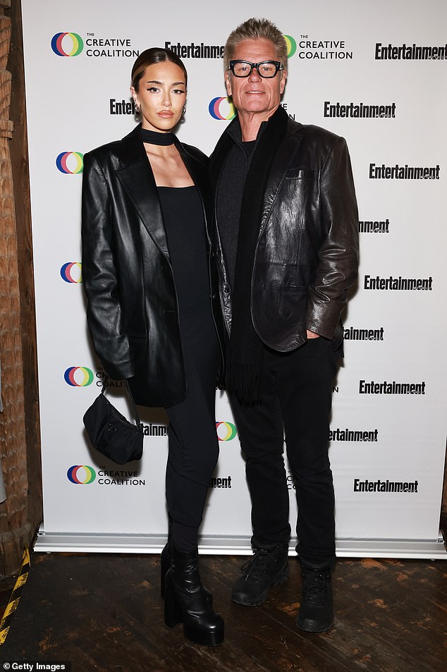 Star-studded appearance: Delilah and her father, who is married to Real Housewives star Lisa Rinna, posed together for a quick photo shoot after arriving at the gala on Saturday