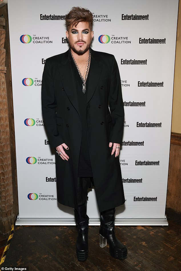 Fashion statement: Adam Lambert was also in attendance at the awards gala on Saturday and looked stylish in chunky, all-black, heeled boots with a clear heel.