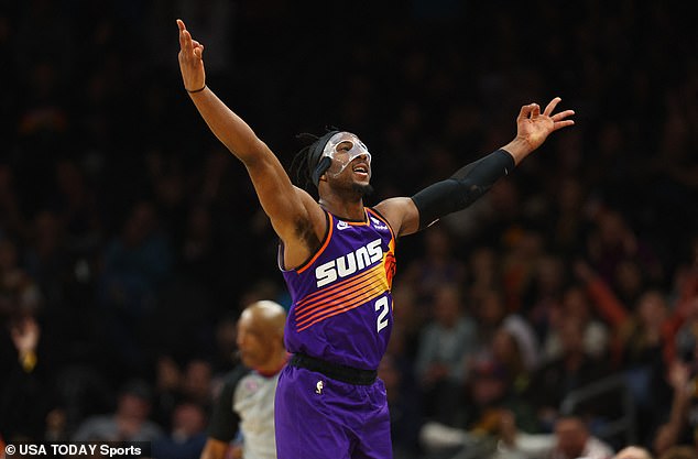 Phoenix Suns forward Josh Okogie celebrates a three-point shot against the Indiana Pacers.