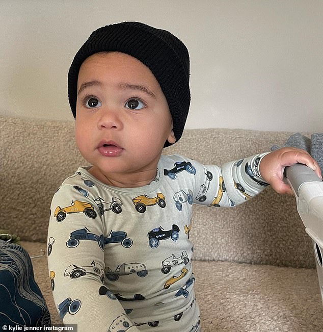 Adorable: The TV personality shared a series of photos that showed her 11-month-old son's face for the first time nearly a year after he was born