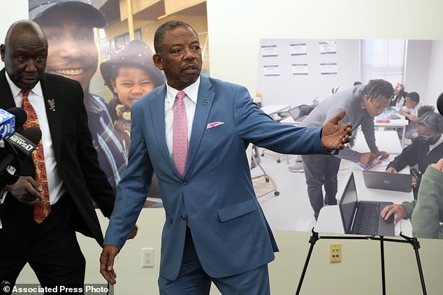 Attorneys Benjamin Crump, left, and Carl Douglas, right, held a news conference Friday.