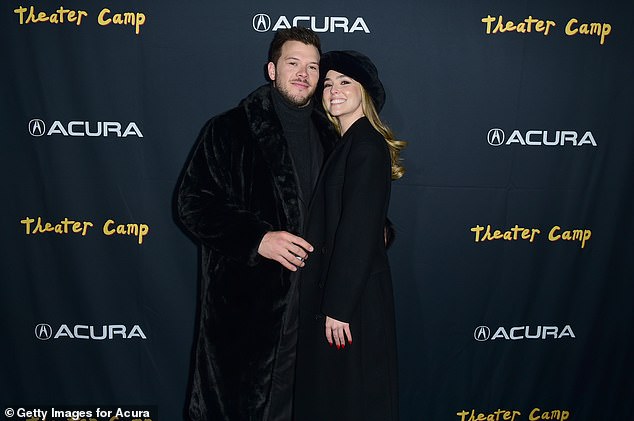 Happy couple: The two lovebirds, who started dating in 2021, cuddled up close together while flashing joyous smiles at the premiere party