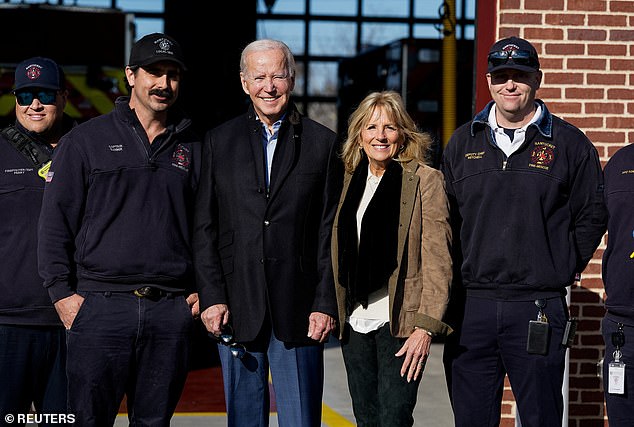 President Joe Biden and Jill Biden pose with firefighters during their Thanksgiving trip to the Nantucket Firehouse.