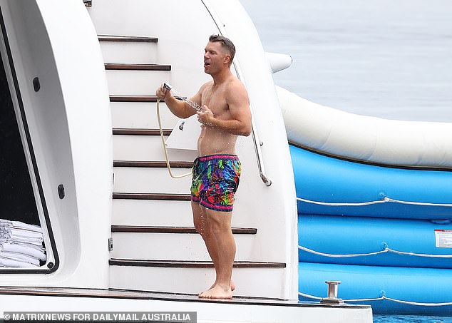 After returning to the boat, the cricketer was seen rinsing his body with an outdoor shower.