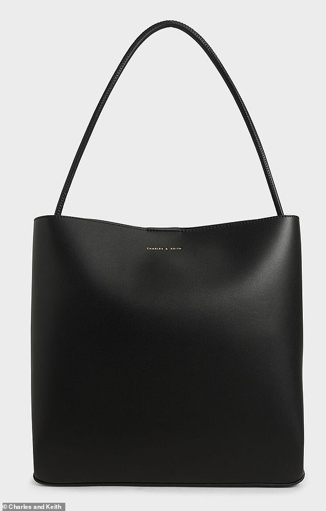 Zoe's black double-handle tote (pictured) is £85 on the brand's UK website and $60 in Singapore