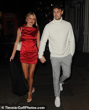 Smart Casual: Meanwhile, Tasha's boyfriend Andrew, 27, donned a smart casual look for the night ahead.  The real estate agent opted for a cream-colored turtleneck, gray checked trousers and elegant matching white trainers.